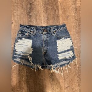 Levi's Medium Blue Jean Shorts with Distressing and Frayed Hem